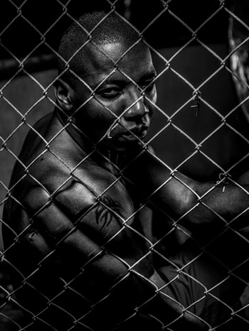 Shouldn't be too hard to pick up on the "tough guy" mood I set for this photo of an athlete that I took while teaching a flash photography workshop earlier this year. But not every mood needs to be so ominous. The mood could be bright and clean just as easily.